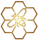 Golden bee in honeycomb cell formation.