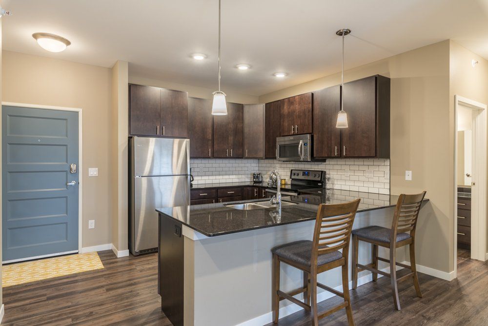 Kitchen island with barstools