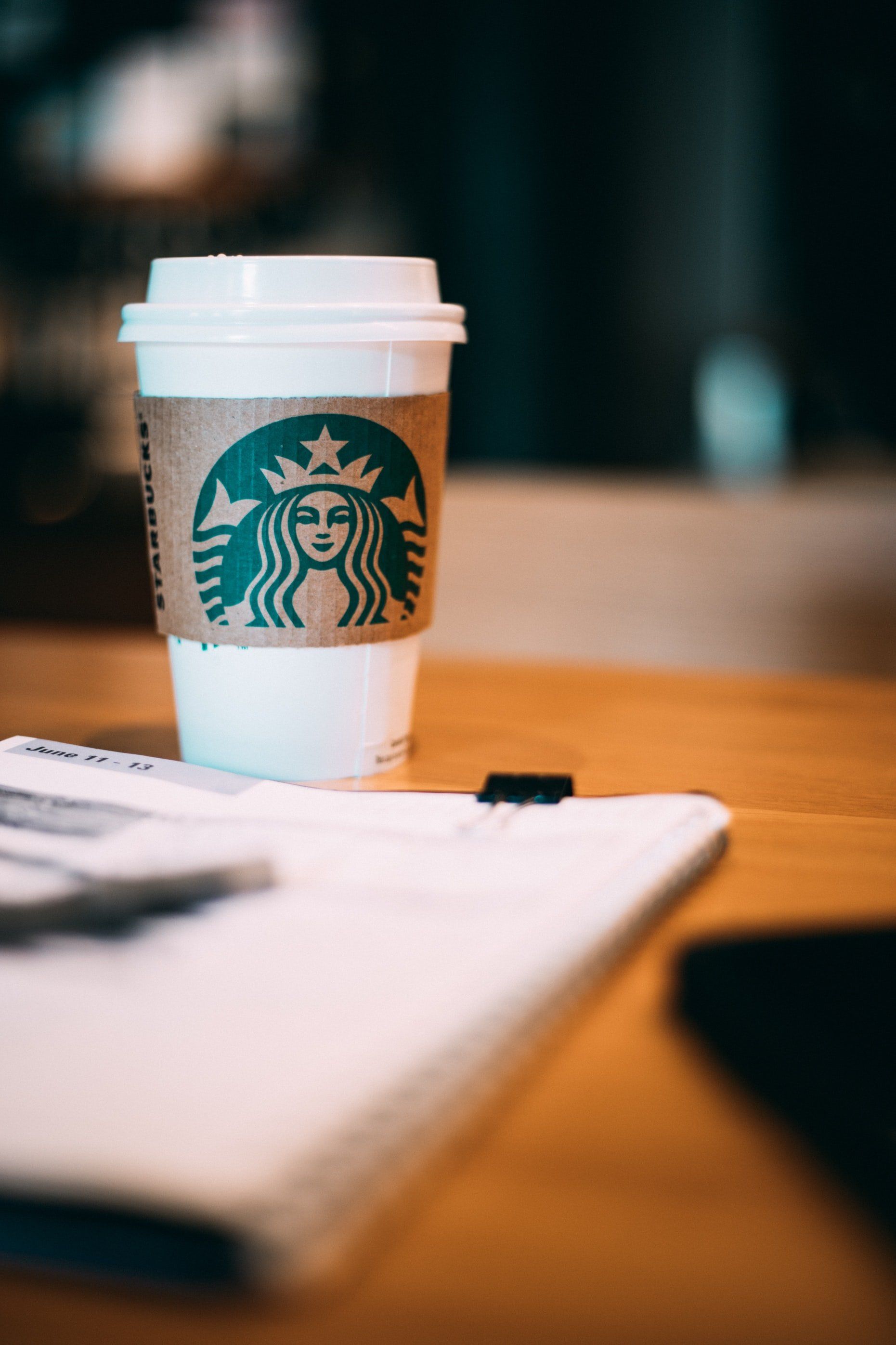 Starbucks cup on table