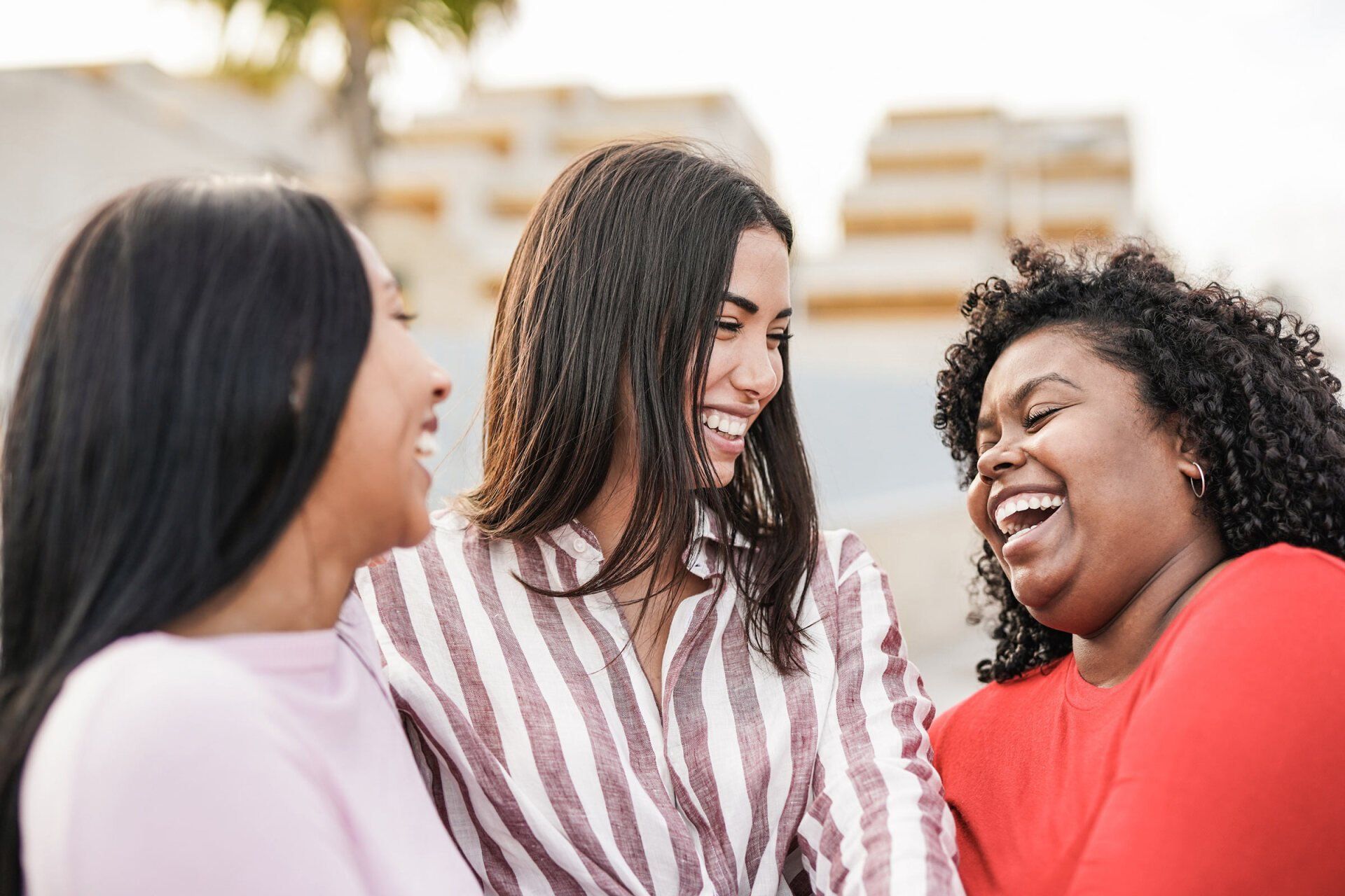 Group of girlfriends laughing
