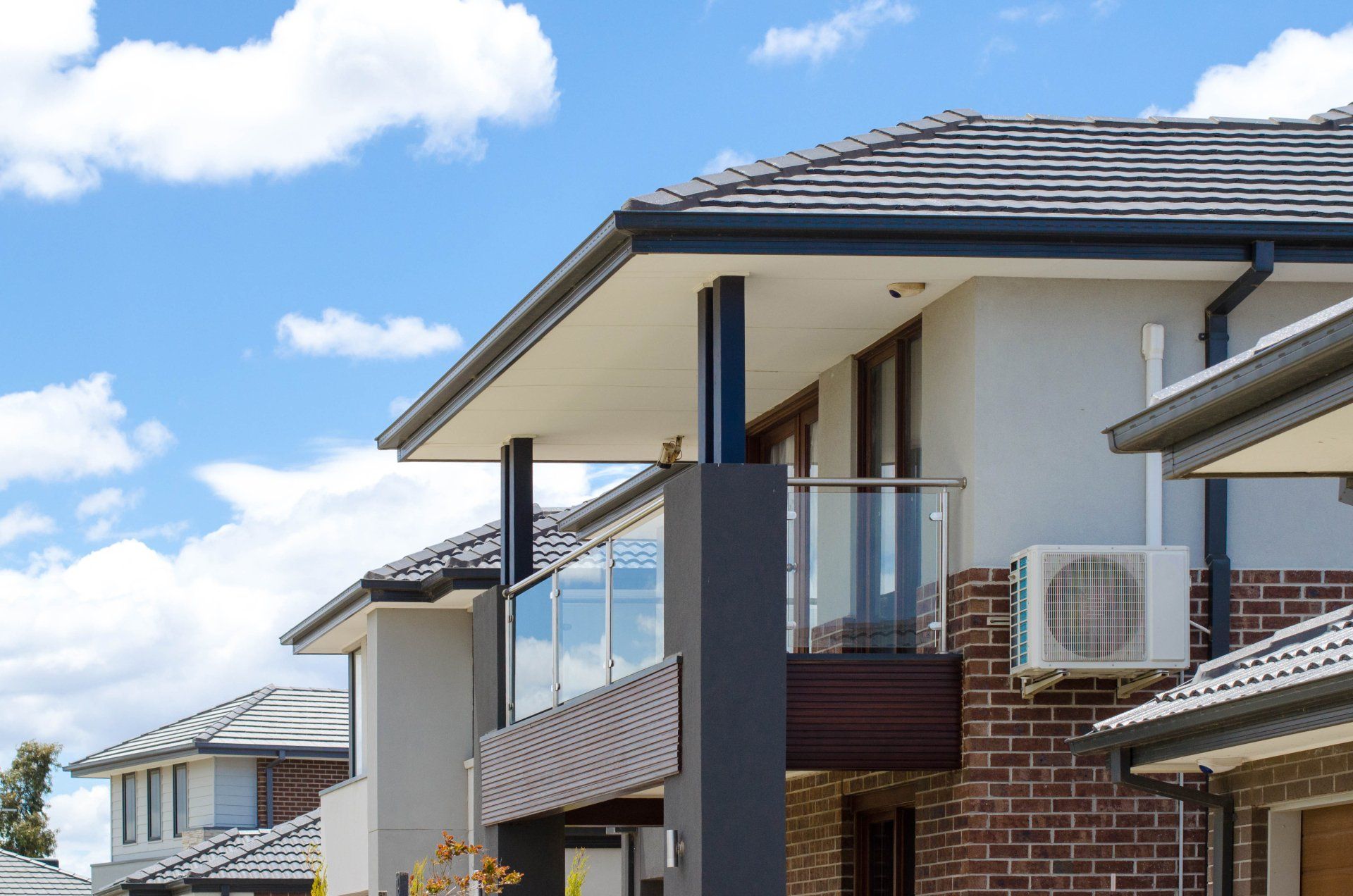 The balcony of a modern two-story residential house or Australian home in a suburb. Concept of real estate development, the housing market, or residence. Melbourne, VIC Australia.