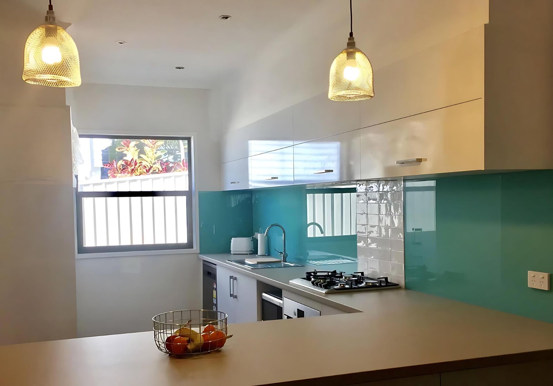 A Kitchen With a Bowl of Fruit on the Counter — Cessnock Glass in Port Stephens, NSW
