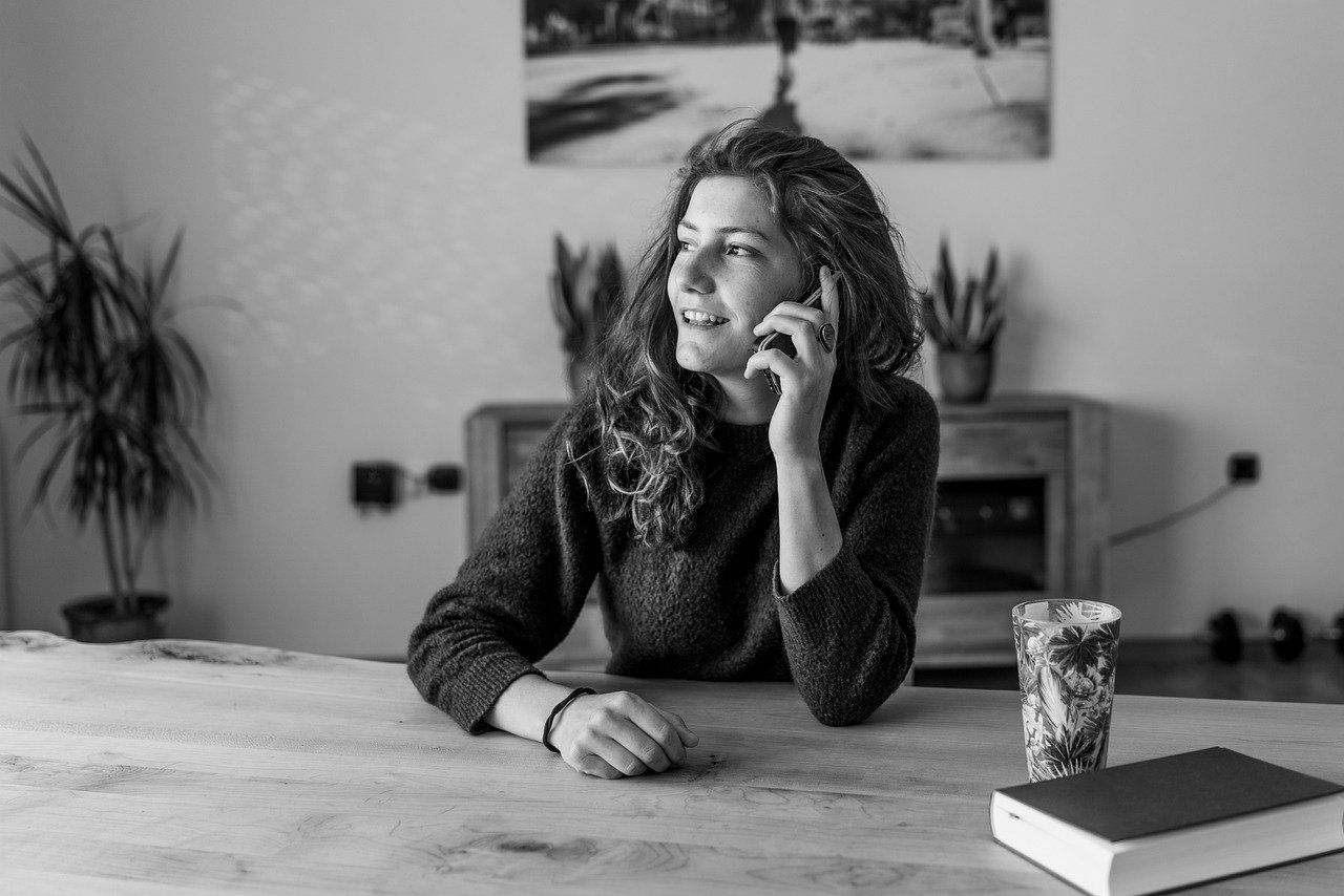 Image of a woman on the phone