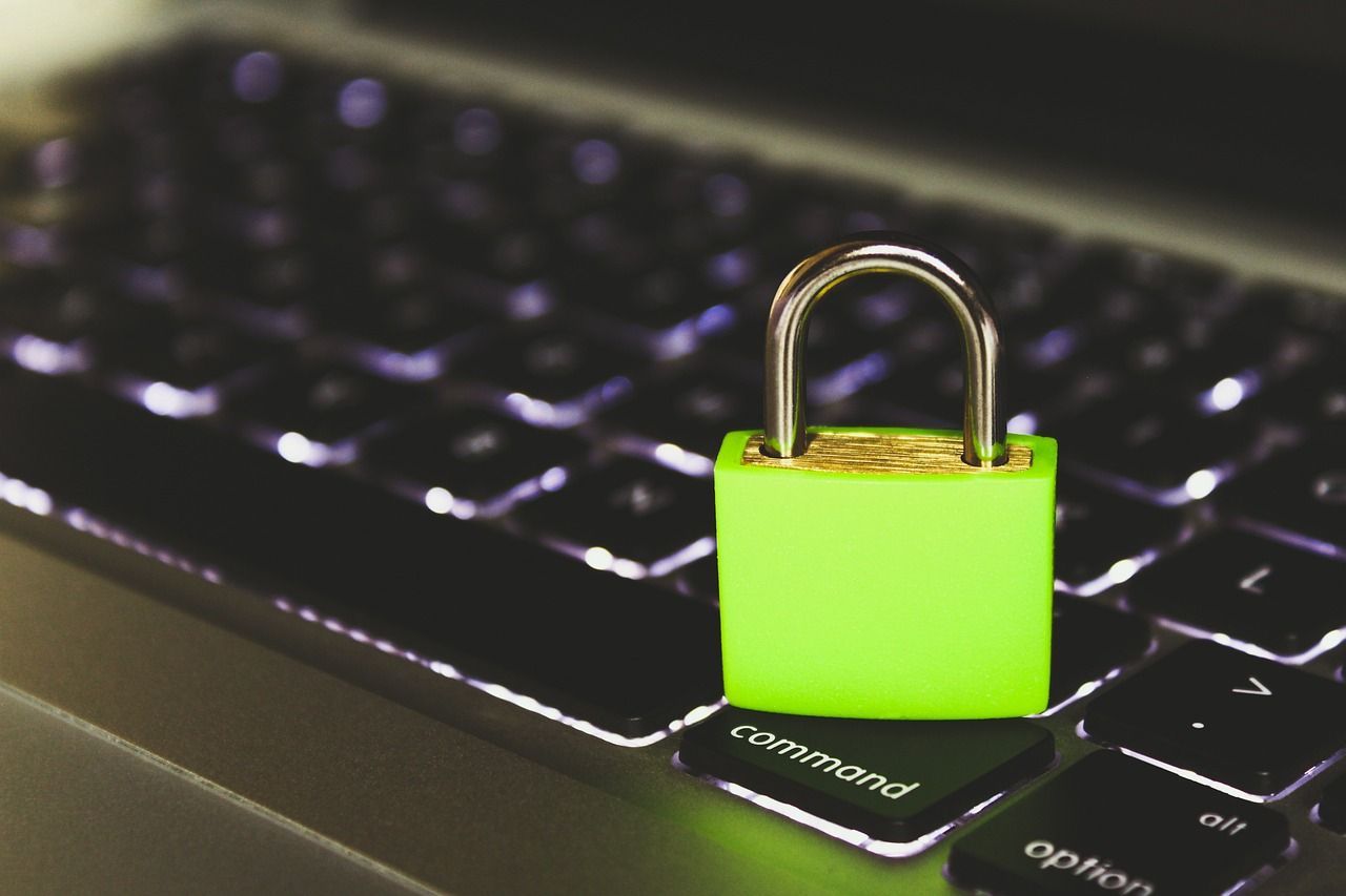 padlock ona keyboard indicating cyber risk