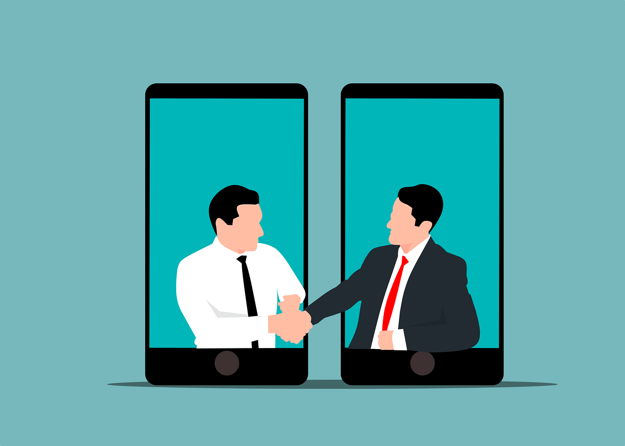 Image of two people having a virtual check in meeting to keep remote staff engaged