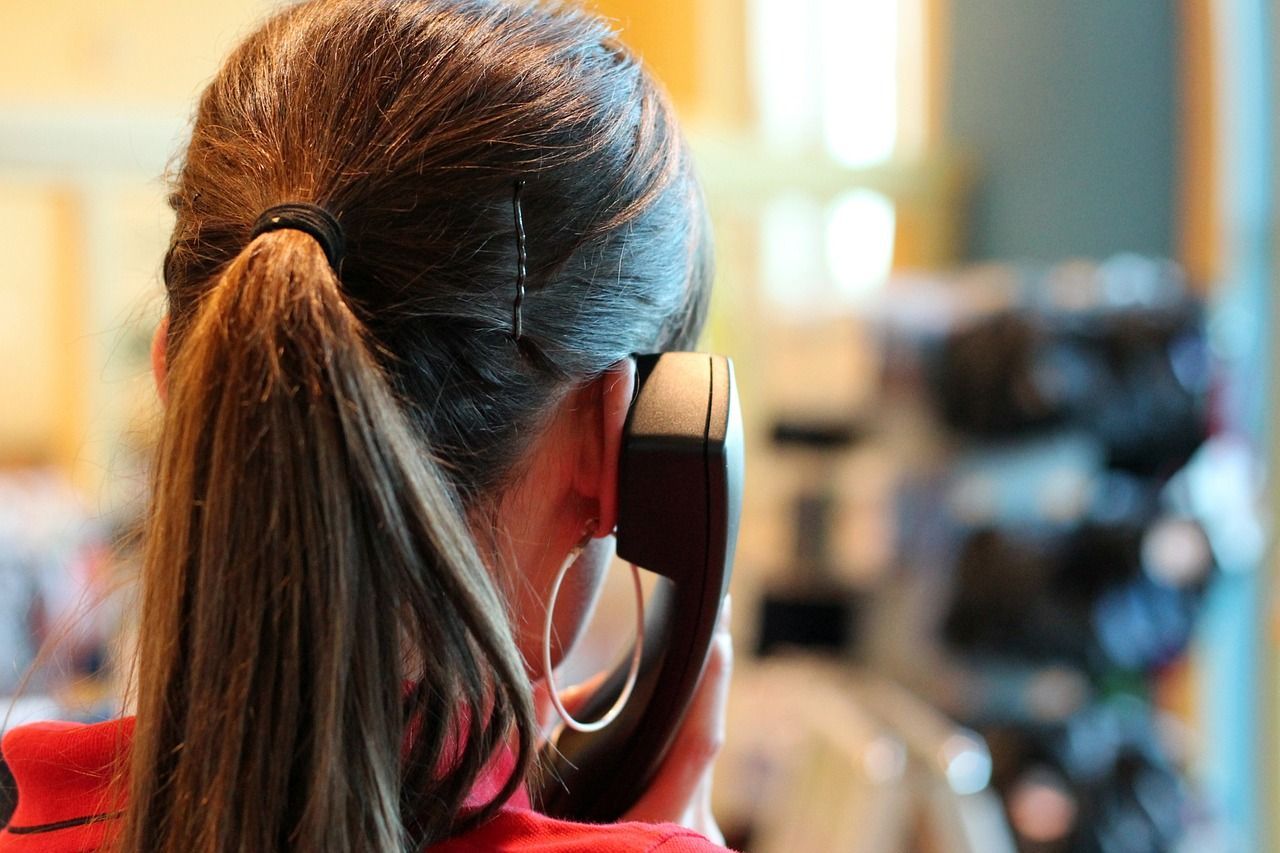 woman making a VoIP phone call