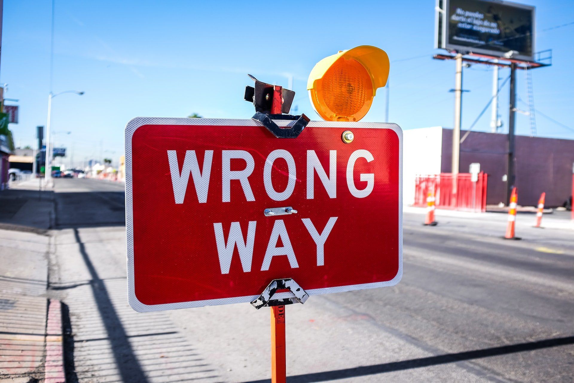 road sign saying wrog way