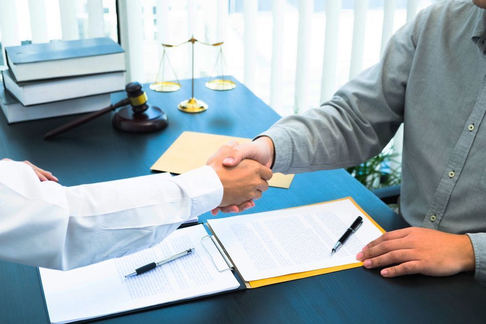 Lawyer provide legal advice to clients regarding business law — Solicitors in Port Stephens, NSW