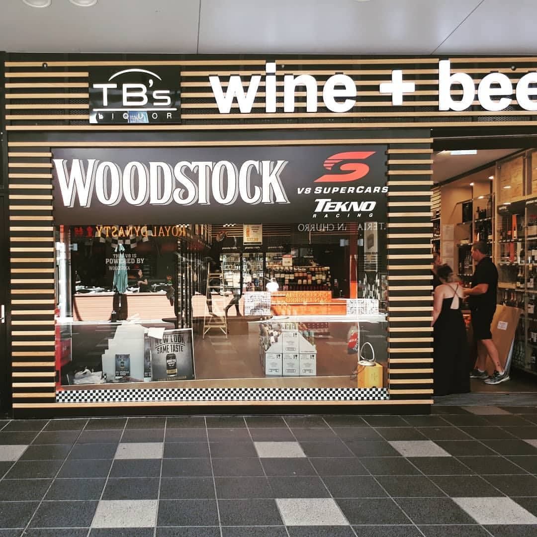 Vinyl Graphics Installed At A Liquor Store — DNA Signs in Burleigh Heads, QLD