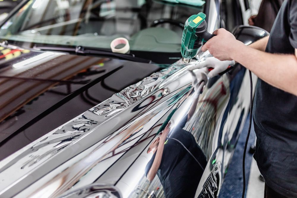 Professional Installation Of Vehicle Wrap — DNA Signs in Burleigh Heads, QLD