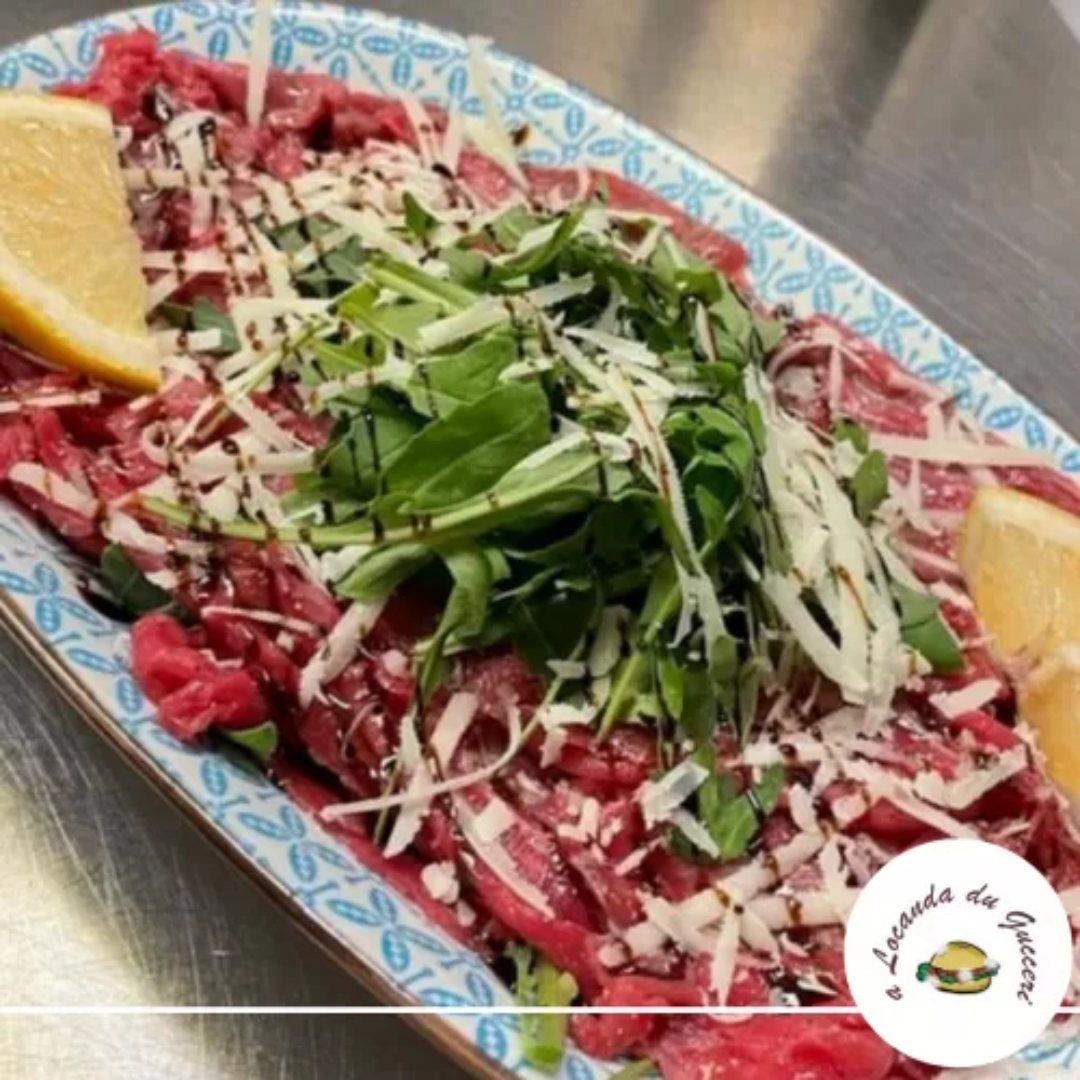 albese con grana, rucola e aceto balsamico