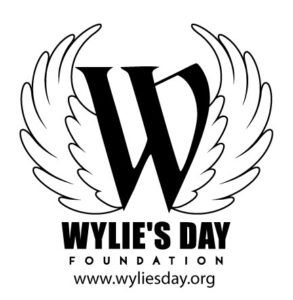 A black and white logo for wylie 's day foundation