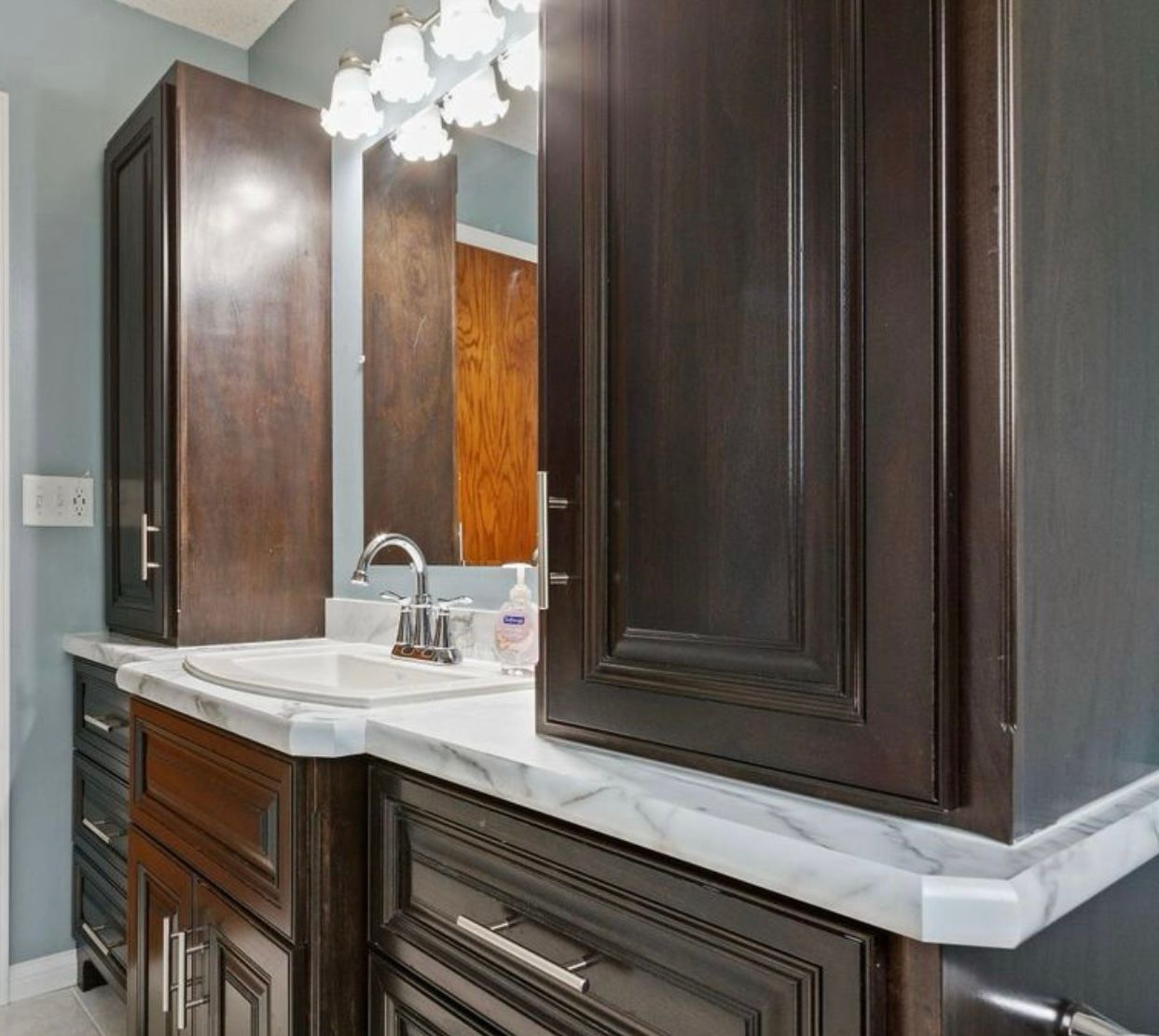White Oak Luxe Collection double bathroom vanity with white countertop and modern design in Centerville, Minnesota.