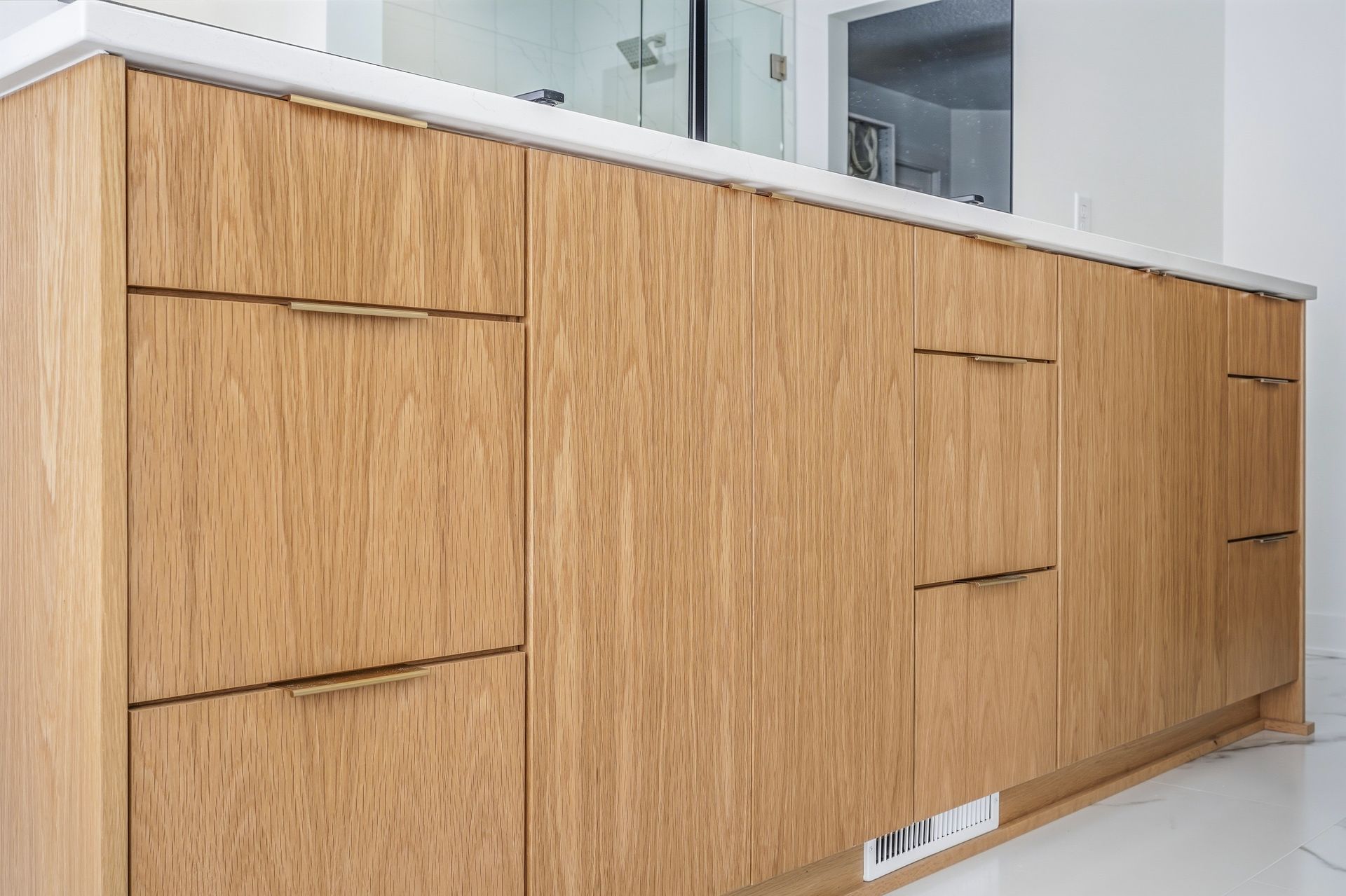 Close-up of custom white oak bathroom vanity cabinetry and drawer fronts in Centerville, MN