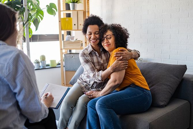 Lesbian Couple Getting Relationship Counseling | Rochester, NY | Laurie Burns LCSW-R CGP