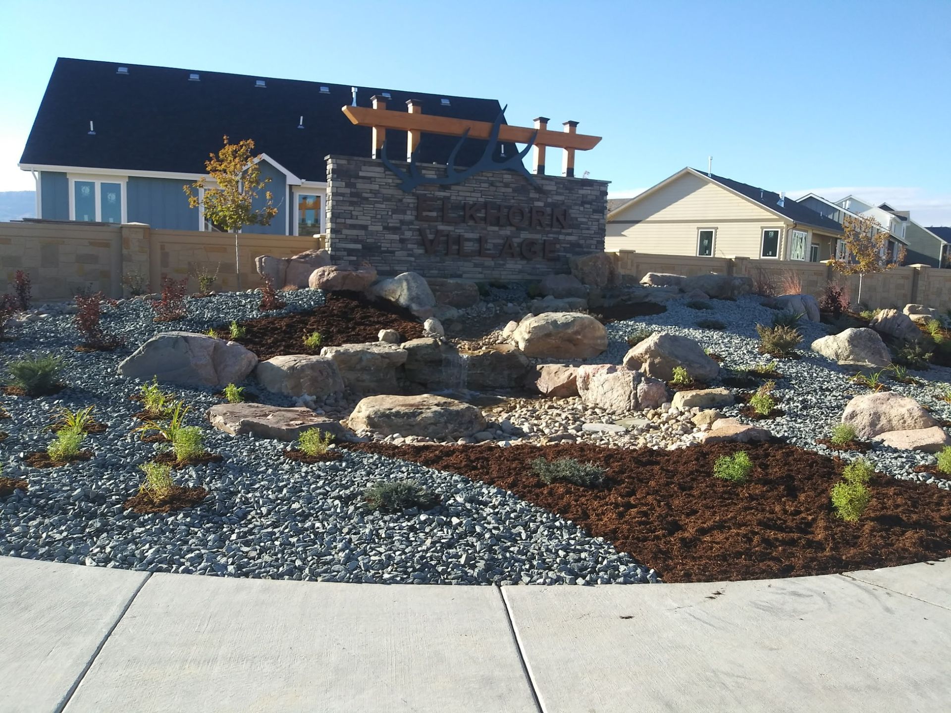 A landscaped entrance sign for 