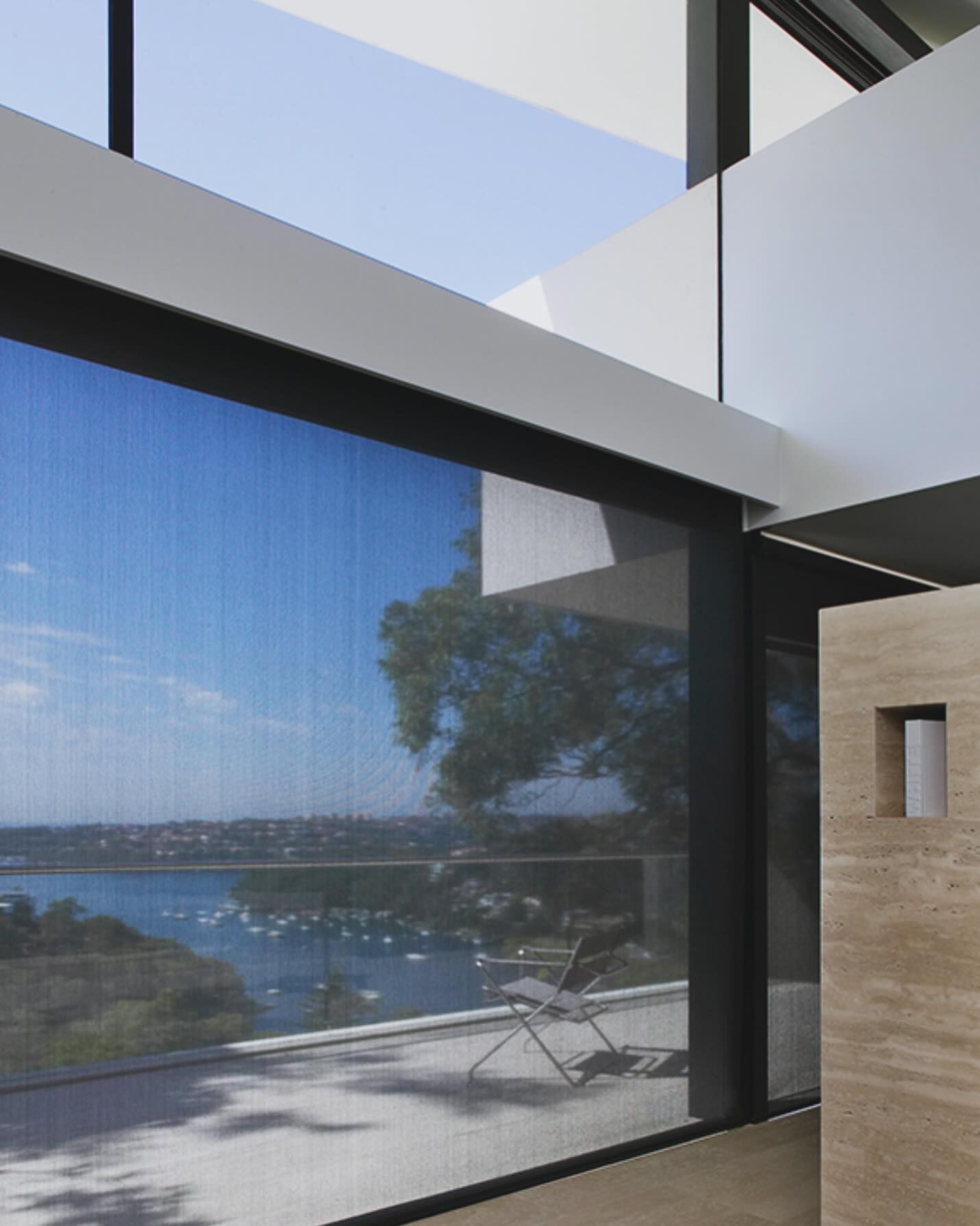 A Living Room With A Couch And A Rocking Chair — Southern Blinds & Awnings In Balaclava NSW