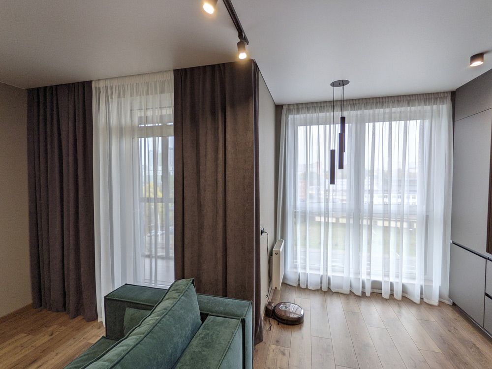 Elegant Brown and White Curtains Adorning a Space— Southern Blinds & Awnings In Sutton Forest NSW