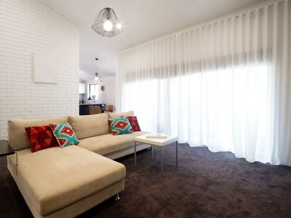 Modern Living Room with Elegant Sheer Curtains — Southern Blinds & Awnings In Kangaroo Valley NSW