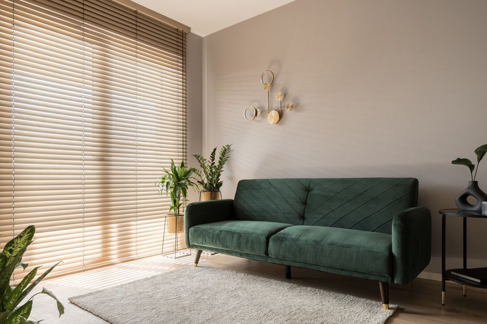 Elegant Living Room with Spacious Window Wall adorned with Wooden Blinds — Southern Blinds & Awnings In Kangaroo Valley NSW