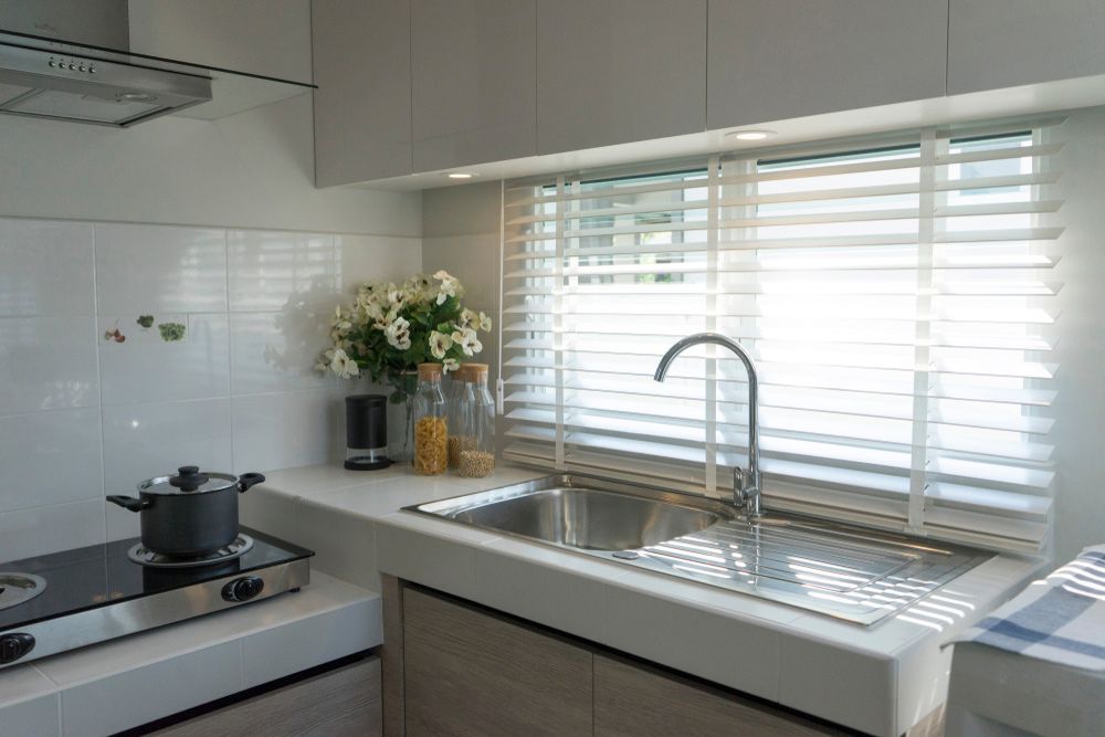 Contemporary Kitchen with Wooden Accents, Iron Sink, and Window Blind — Southern Blinds & Awnings In Picton NSW