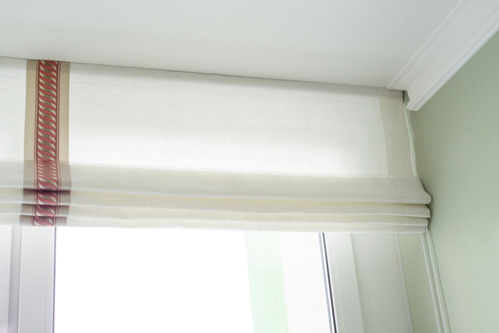 Elegant White Roman Curtains Enhance Interior Ambiance — Southern Blinds & Awnings In Sutton Forest NSW