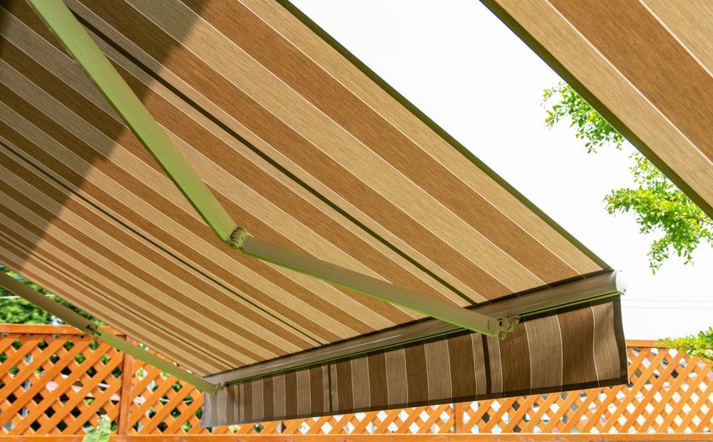 Sunny Day: Opened Awning Covered by Sun Shield — Southern Blinds & Awnings In Moss Vale NSW