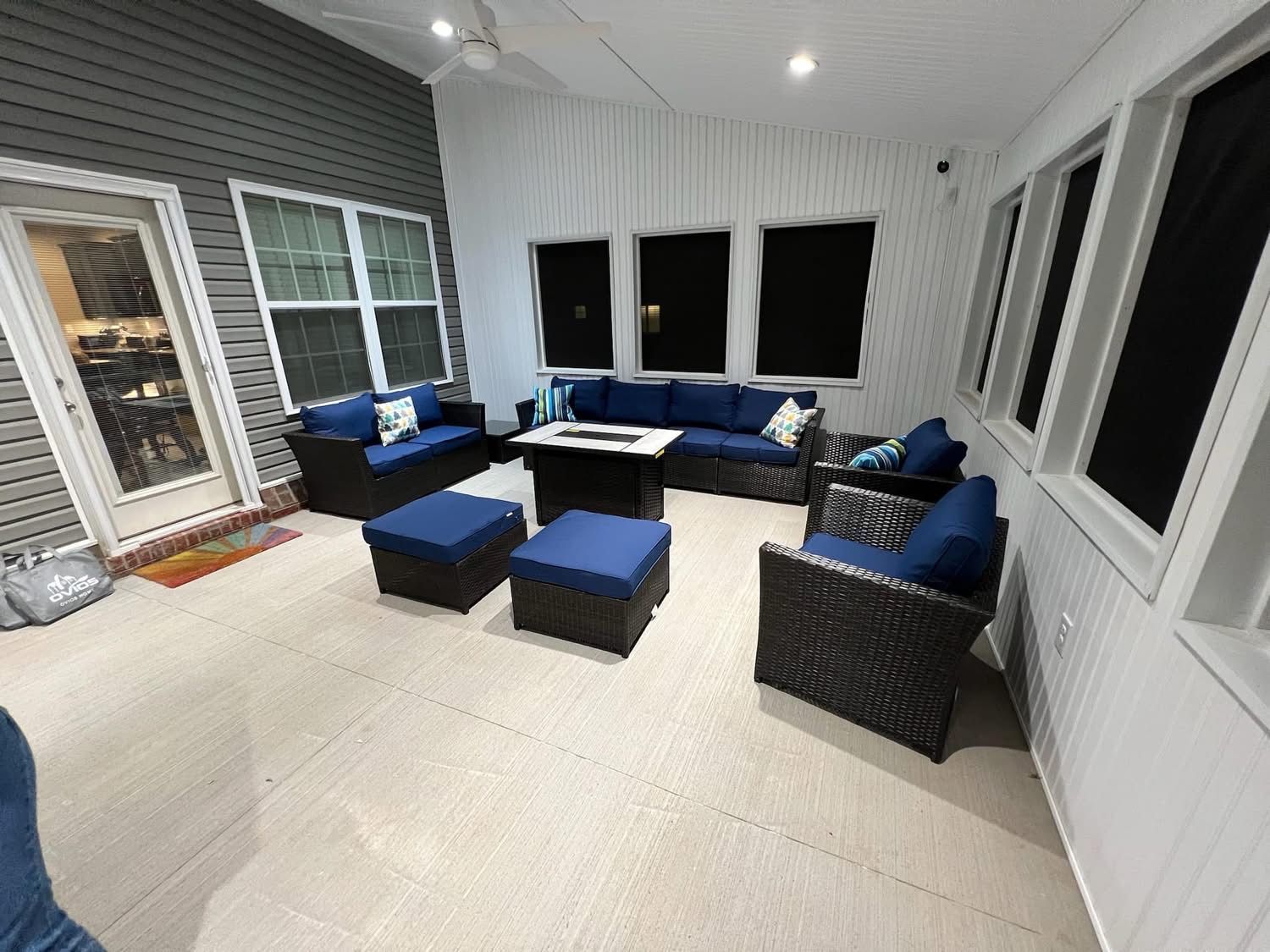 A living room with a lot of furniture and a table