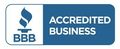 A blue button that says accredited business on it