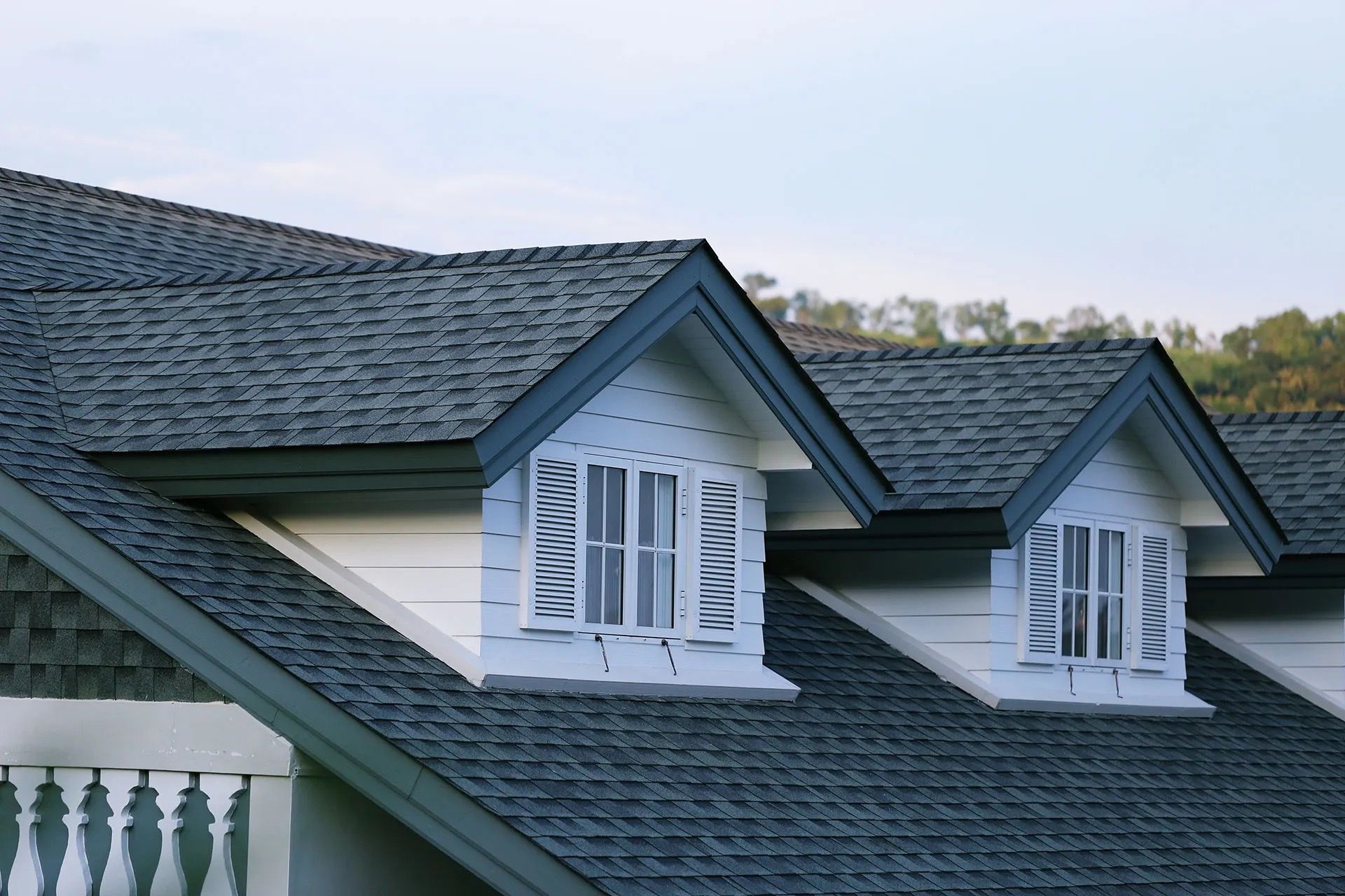 A house with a roof that has a lot of shingles on it