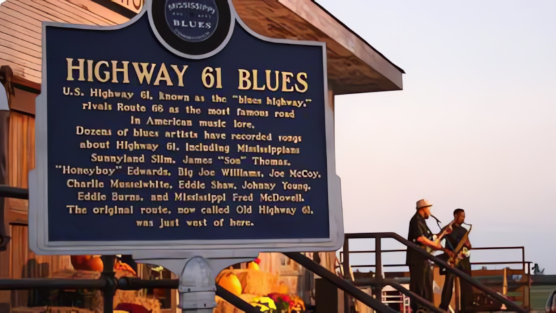 A blue sign that says highway 61 blues on it