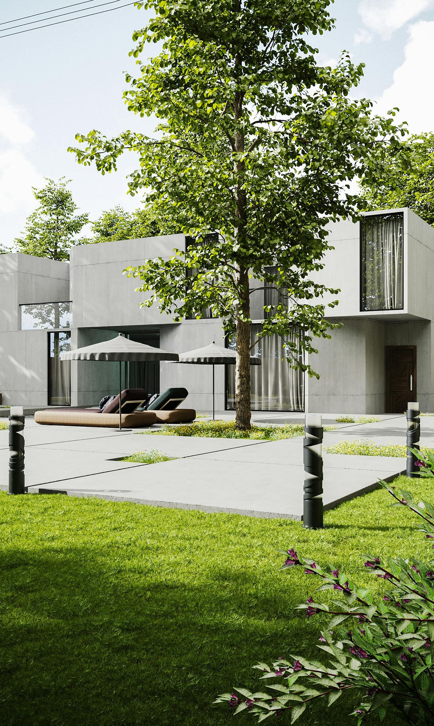 Modern gray house with large windows, trees, and lounge chairs.
