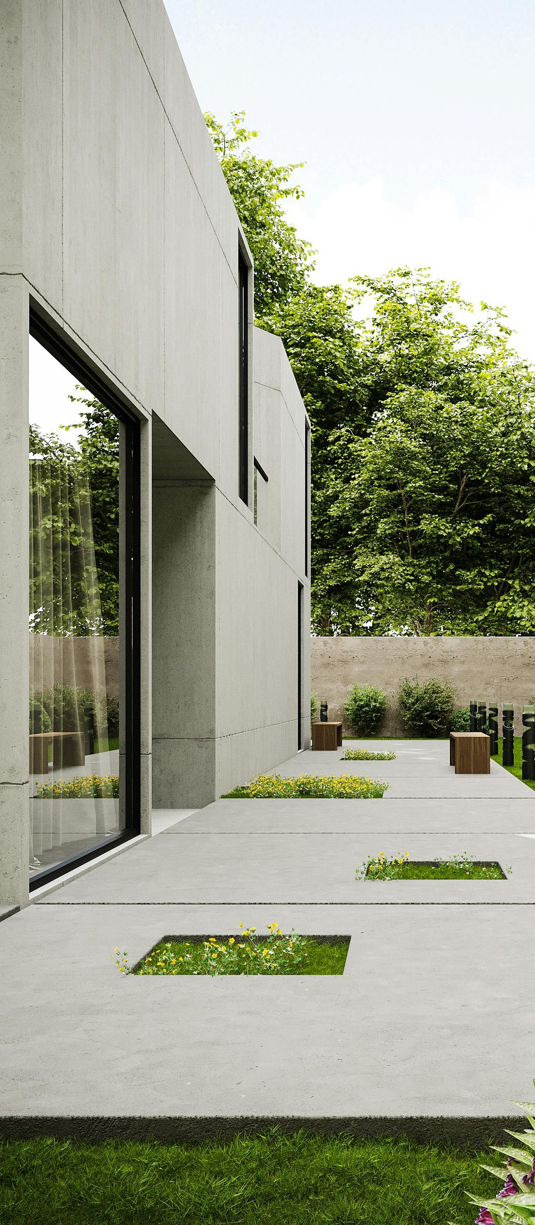 Modern concrete courtyard with rectangular grass cutouts, trees, and a glass wall beside a building
