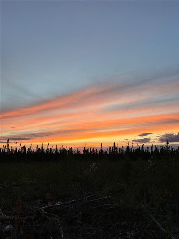 Sunset sky over Saskatchewan wilderness at a Cosa Resources Canadian uranium exploration site.