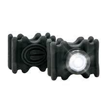 Black accordion-style flashlight with a bright white light on a white background