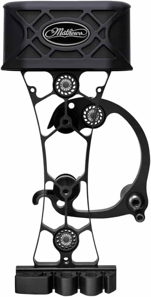 Black metal archery bow sight with circular adjustment knobs and mounting brackets on a white background