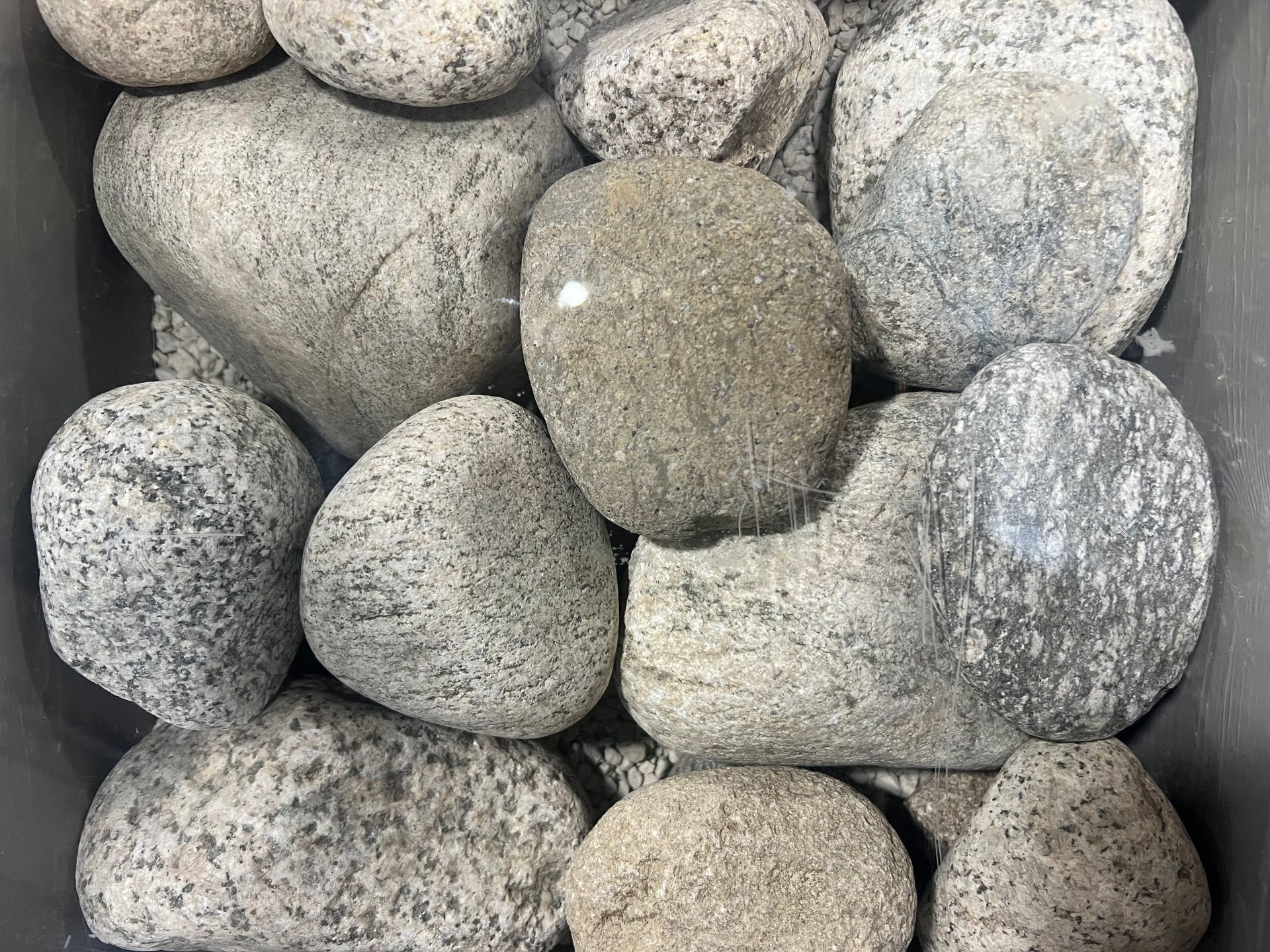 Stockman Stoneworks Provides Bulk Glacier Cobbles Rock Solutions for Your Missouri Landscape.