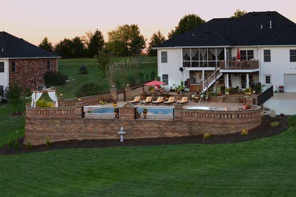 Choose Stockman Stoneworks in Missouri to Create a Beautiful Retaining Wall for Your Landscape.
