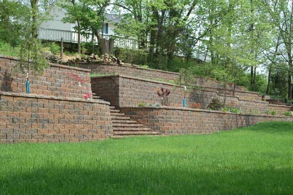 Transform Your Landscape With a Beautiful Retaining Wall Courtesy of Stockman Stoneworks in Missouri.