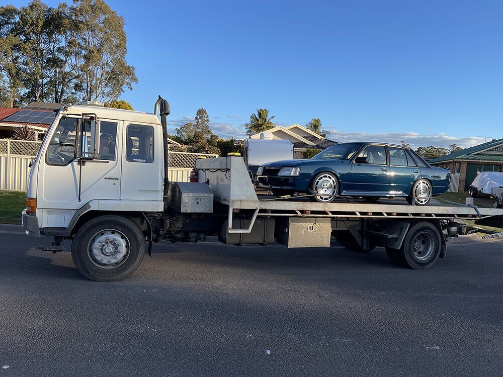Towed Blue Sedan — Big Tim's Towing in Cessnock, NSW