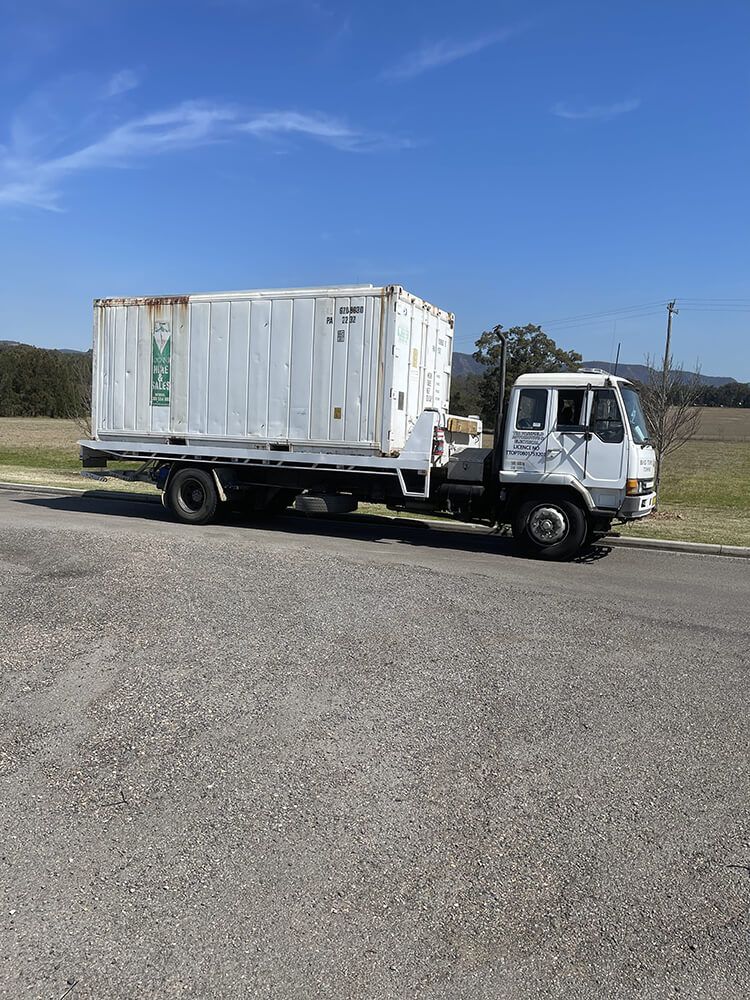 Tow Truck Moving A Container Van — Tow Truck Service - Big Tim's Towing Cessnock
