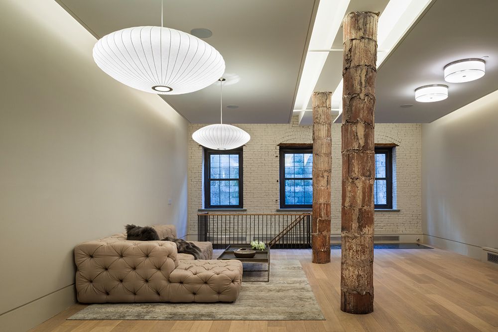 A living room with a couch and a coffee table