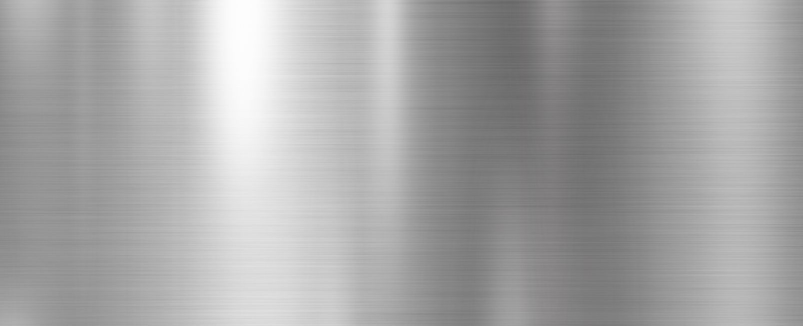 Brushed metal surface with vertical light and dark streaks.