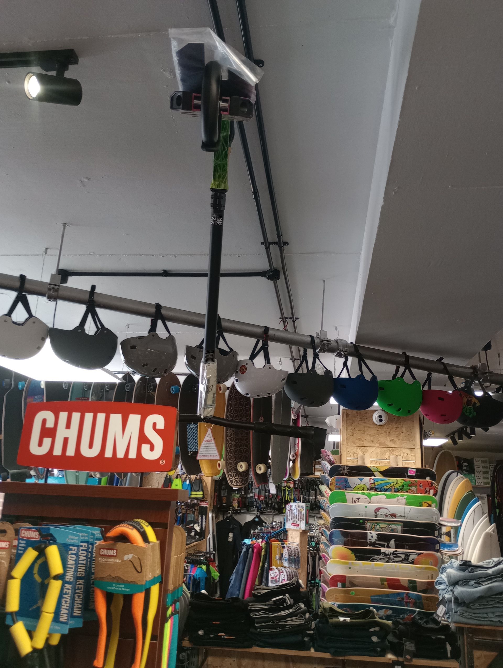 A store with a sign that says chums on it