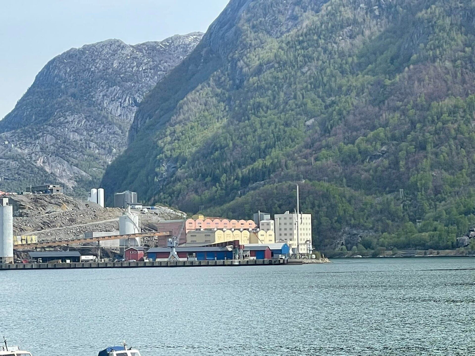 A large body of water with mountains in the background