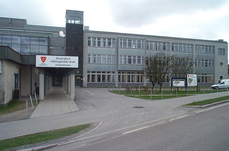 A large building with a sign that says ' ambulance ' on it