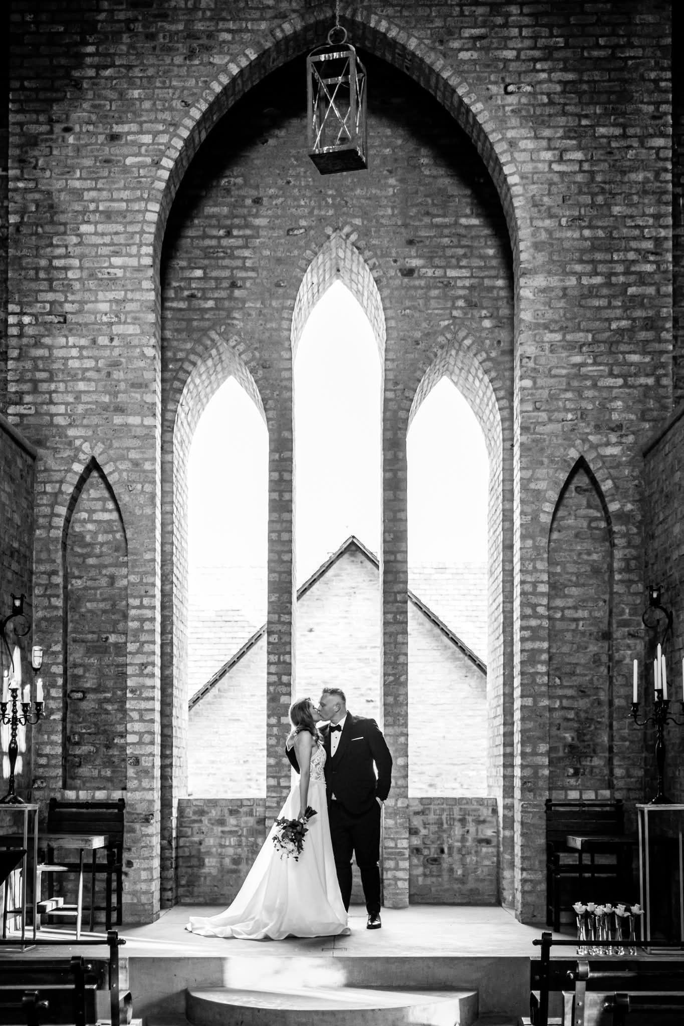 A Couple at the altar at Riverside Castle Wedding venue.