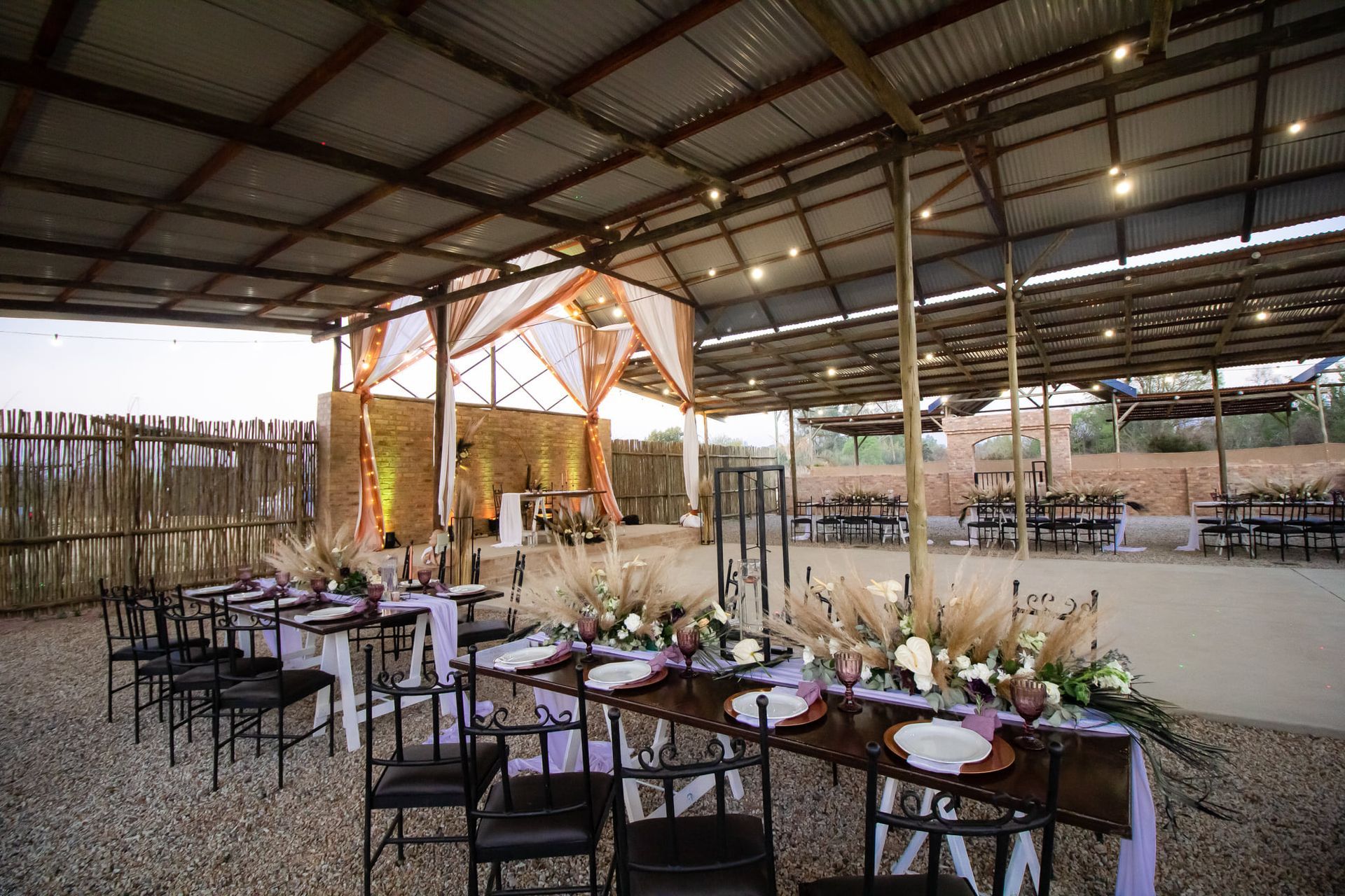 Tables prepared for a lavish event in the Piazza at Riverside Castle, Pretoria East's premier event venue.