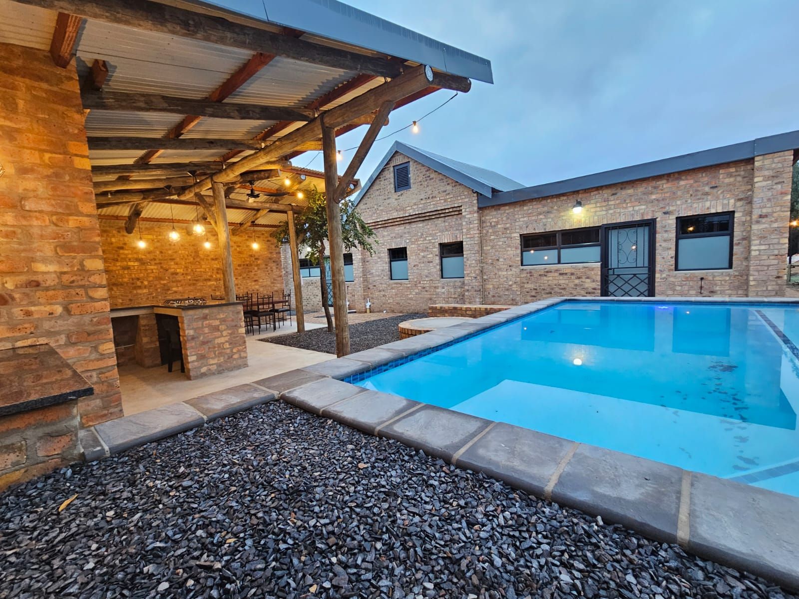 The swimming pool near the sleek and modern new cottages at Riverside Castle in Pretoria.