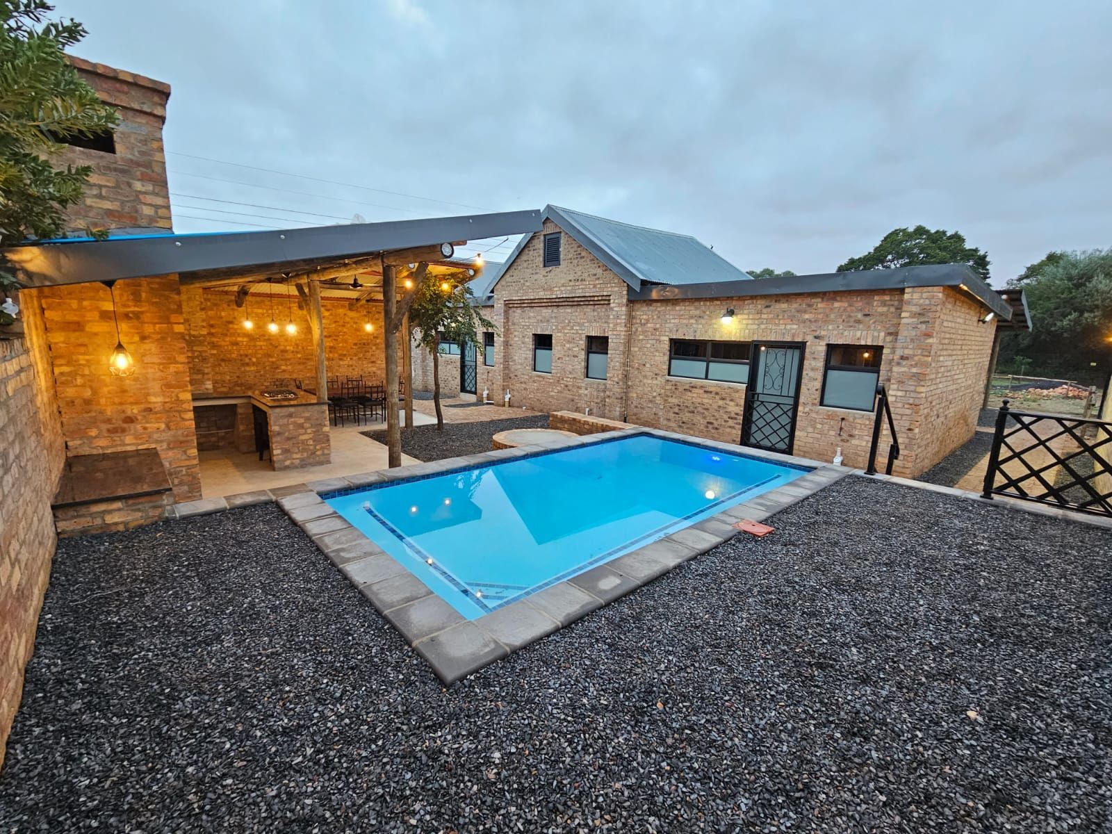 The swimming pool near the sleek and modern new cottages at Riverside Castle, Pretoria.